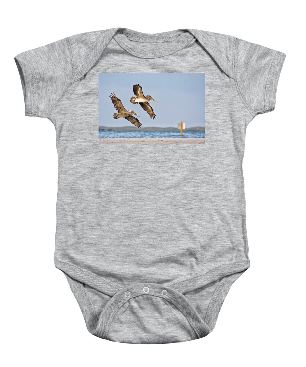 Pelican Baby Onesie featuring the photograph Brown Pelican Pair in Flight by Bob Decker