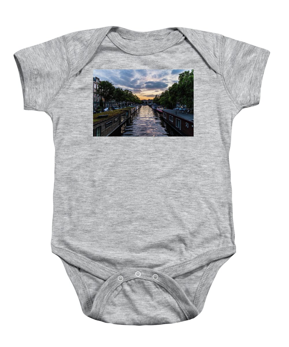City Baby Onesie featuring the photograph City canal at sunset in Amsterdam by Fabiano Di Paolo