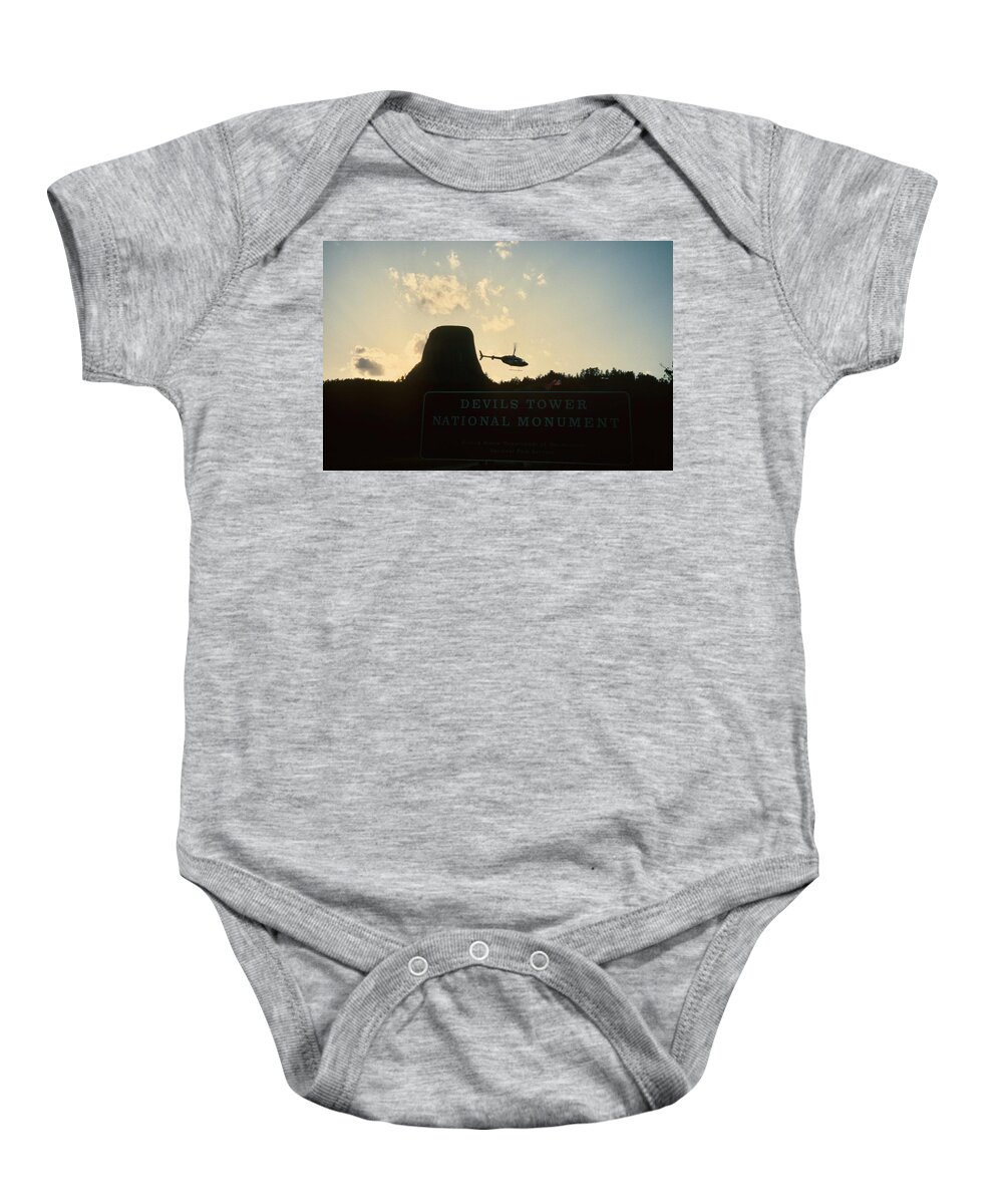 Devils Tower Baby Onesie featuring the photograph Close Encounters at Devils Tower by Gordon James