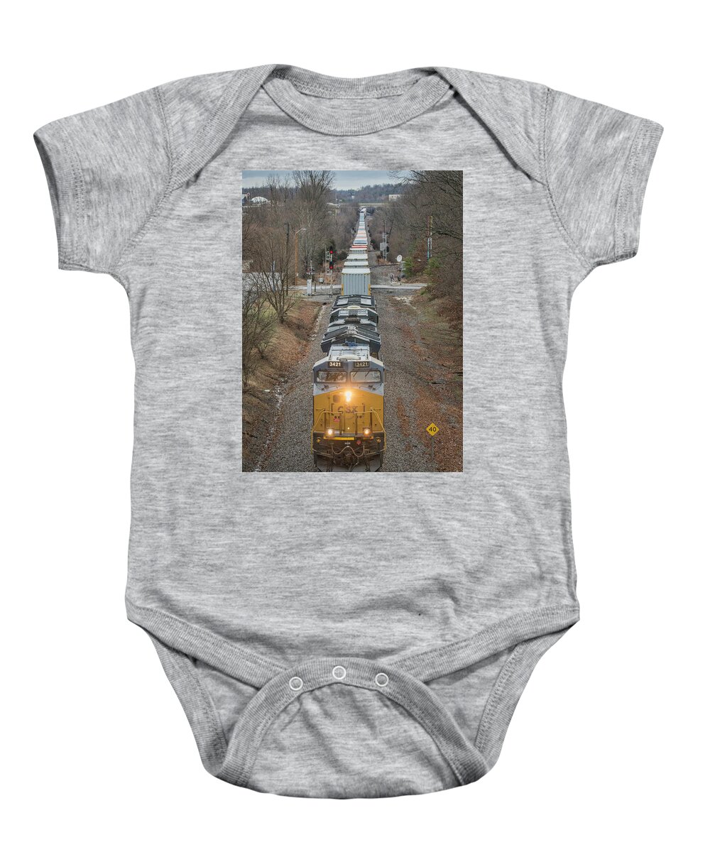 Railroad Baby Onesie featuring the photograph CSX Q025 as it heads south at Madisonville, Ky by Jim Pearson