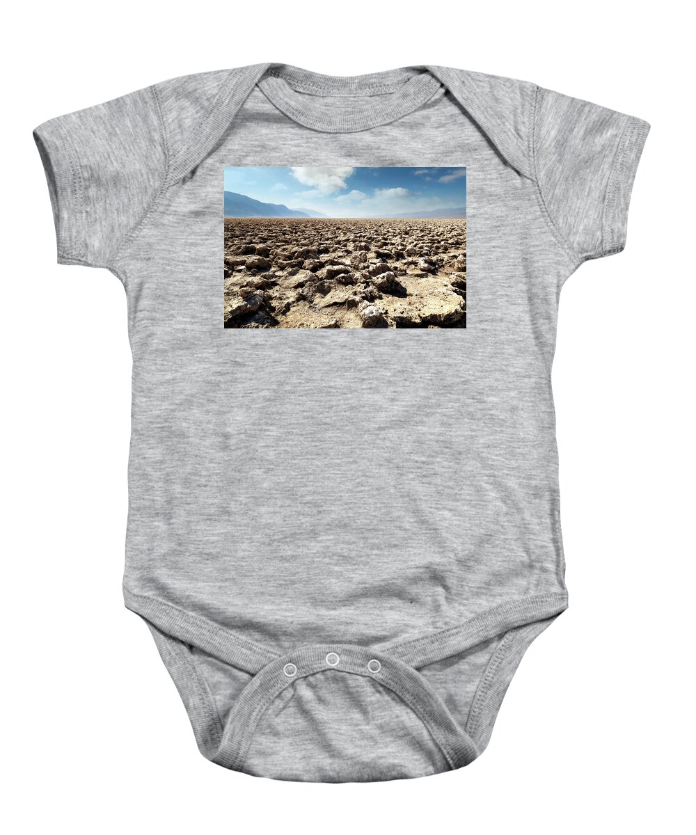 Devils Baby Onesie featuring the photograph Devil's Golf Course II by Ricky Barnard