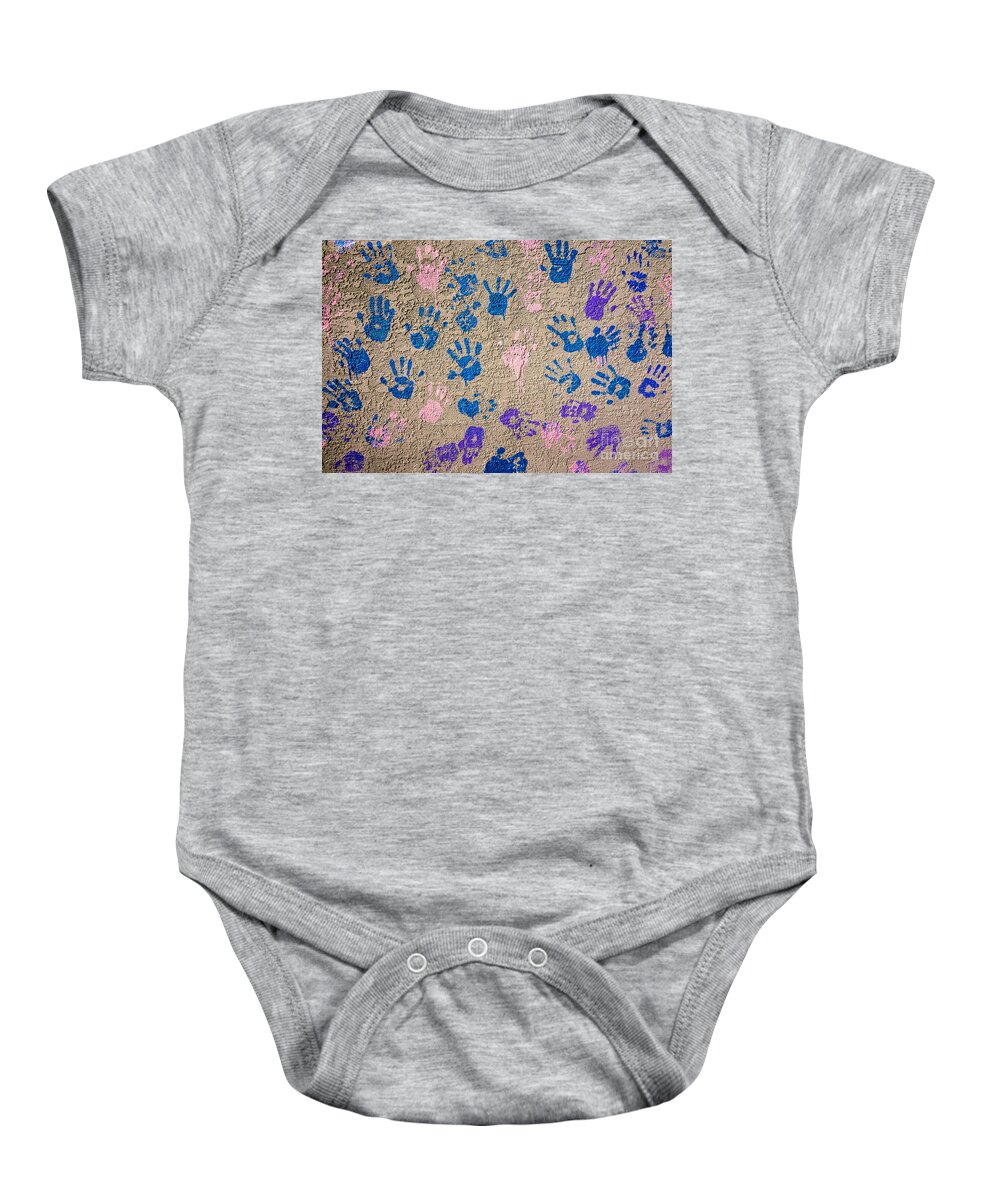 Hand Prints Baby Onesie featuring the photograph Hand Prints - Painted Hands on Concrete - Abstract by Gary Whitton