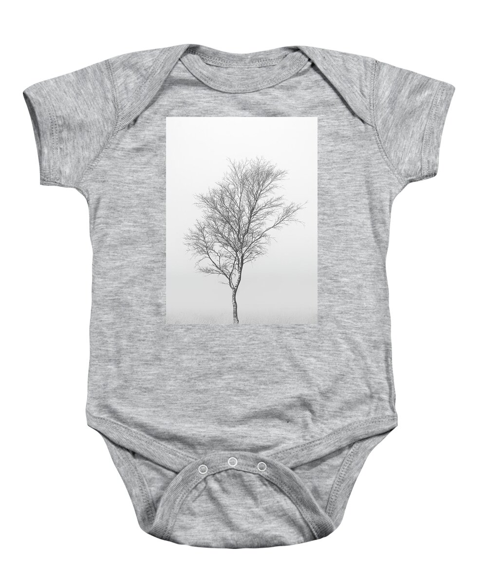 Birch Baby Onesie featuring the photograph Lonely birch tree surrounded by fog by Patrick Van Os