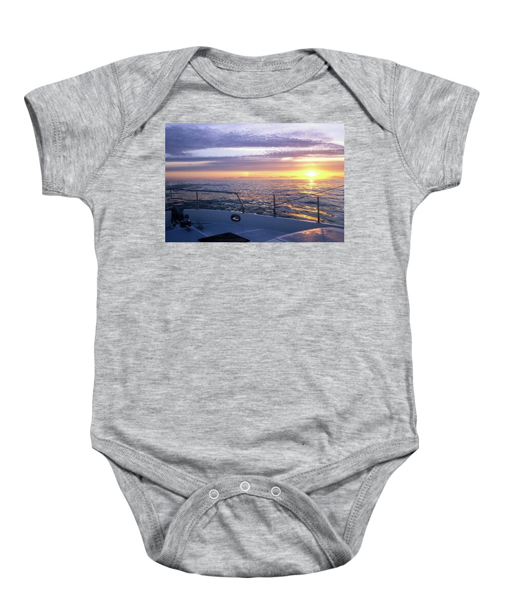 Marine Weather Baby Onesie featuring the photograph sunrise off Washington coast by David Shuler