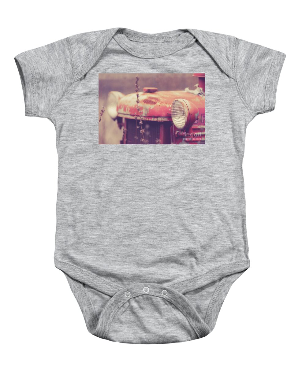 Farmall Baby Onesie featuring the photograph Old Vintage Red Farmall Tractor by Edward Fielding
