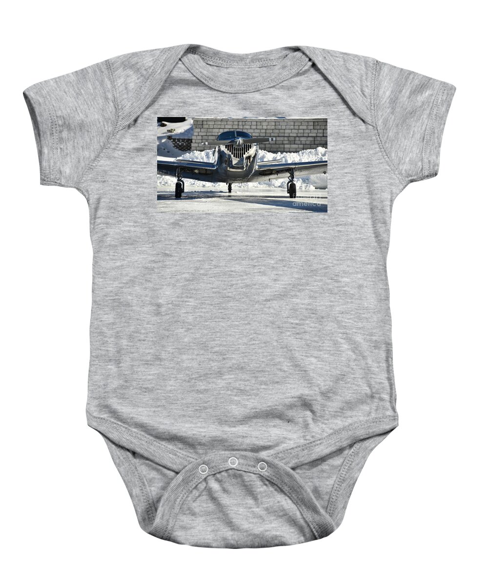 Alton Bay Baby Onesie featuring the photograph Plane on Ice by Steve Brown