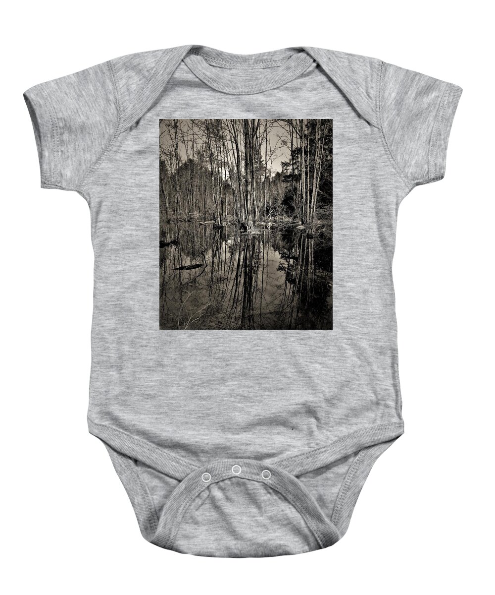 - Reflection Of A Winter Swamp Baby Onesie featuring the photograph - Reflection of a Winter Swamp by THERESA Nye