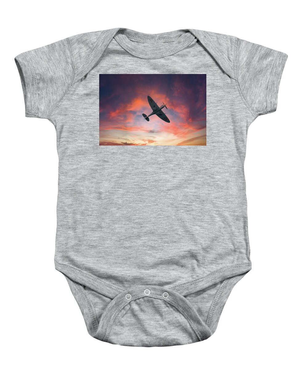 Eastbourne International Airshow Baby Onesie featuring the photograph Spitfire flying at sunset by Andrew Lalchan