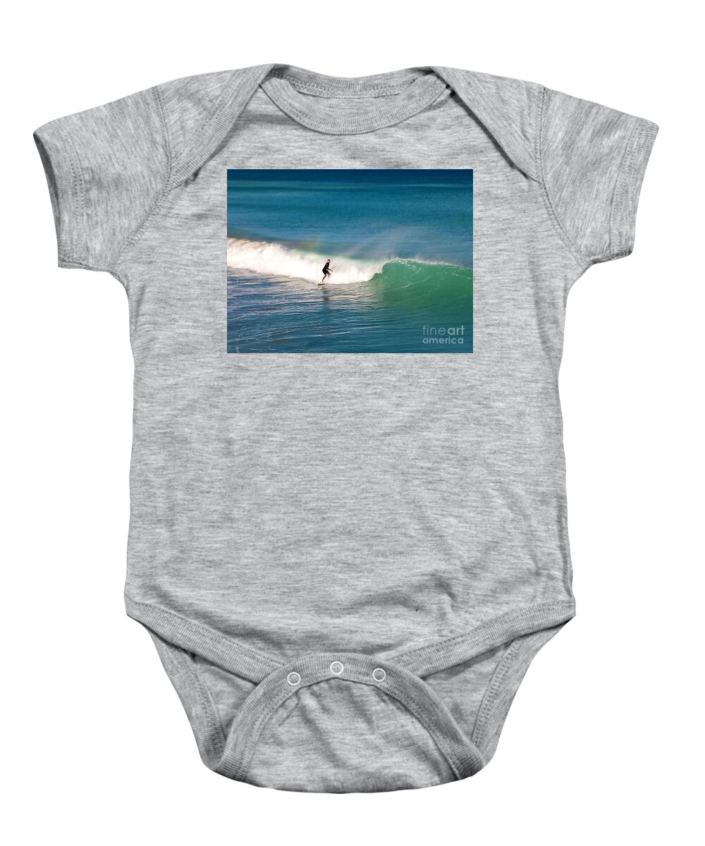 Surf Baby Onesie featuring the photograph Surfing Rainbows by Dani McEvoy