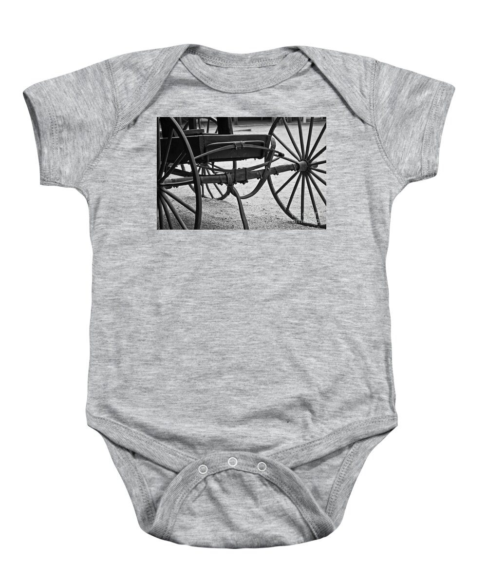 Buggy Baby Onesie featuring the photograph The Back Of A Carriage by Kirt Tisdale