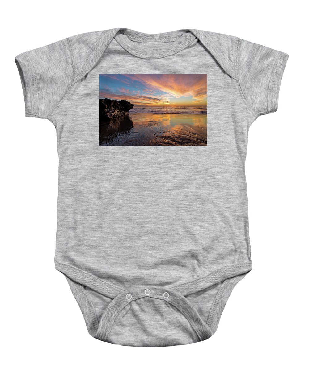 Beach Baby Onesie featuring the photograph The Rock at Sunset by Linda Villers