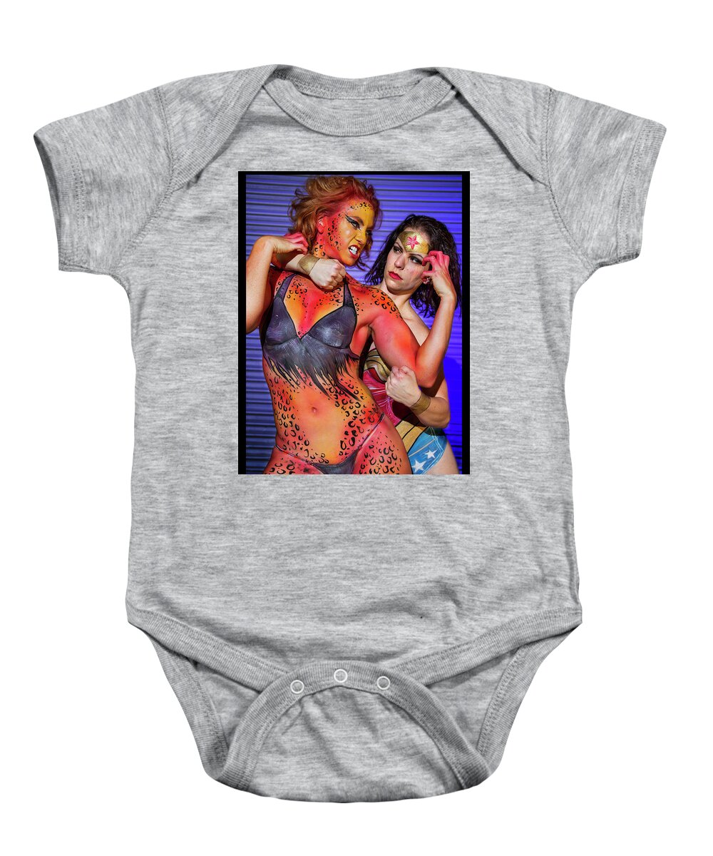 Cosplay Baby Onesie featuring the photograph Wonder Woman vs Cheetah by Christopher W Weeks