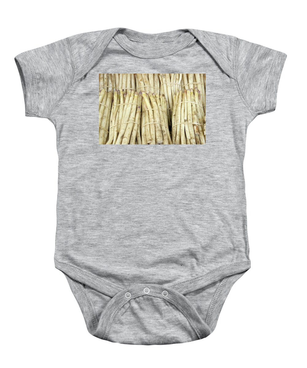 Market Baby Onesie featuring the photograph White asparagus at the farmers market, Chatillon-sur-Loire, Centre, France by Kevin Oke