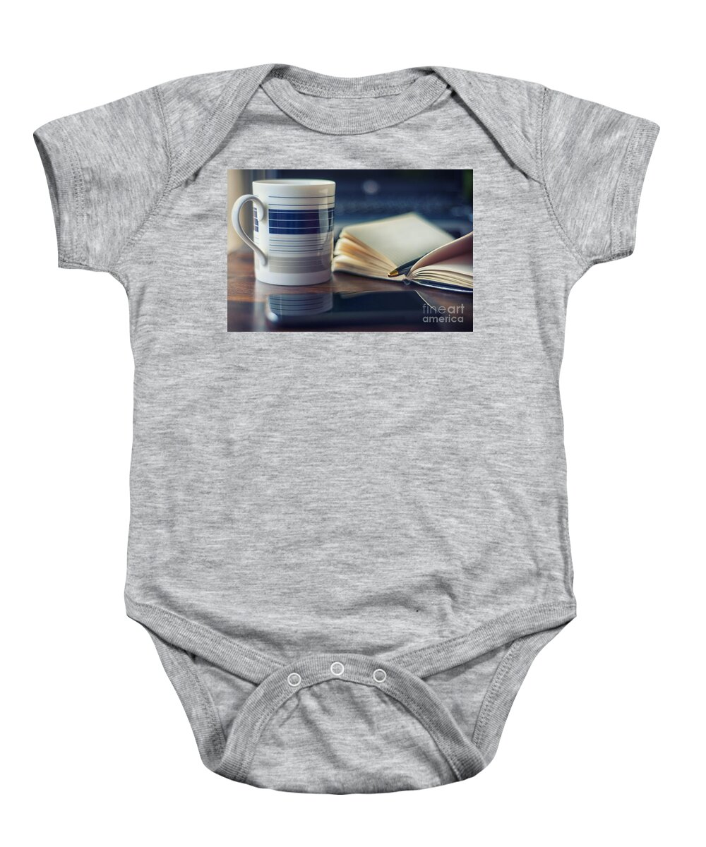 Flower Baby Onesie featuring the photograph Writer by Yvonne Padmos