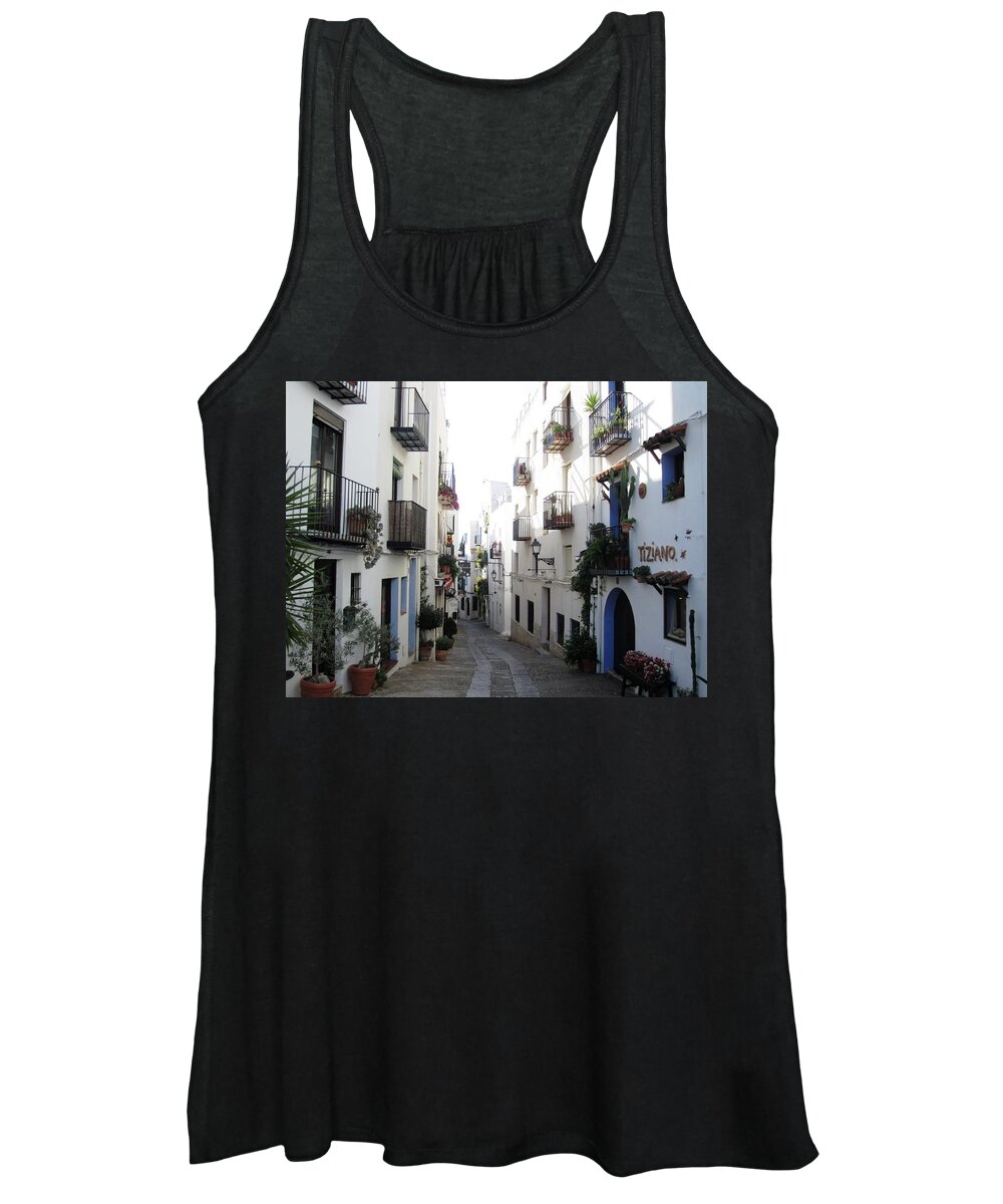 Narrow Women's Tank Top featuring the photograph Lovely Narrow Street and Balconies decorated with Plants in Peniscola Spain by John Shiron