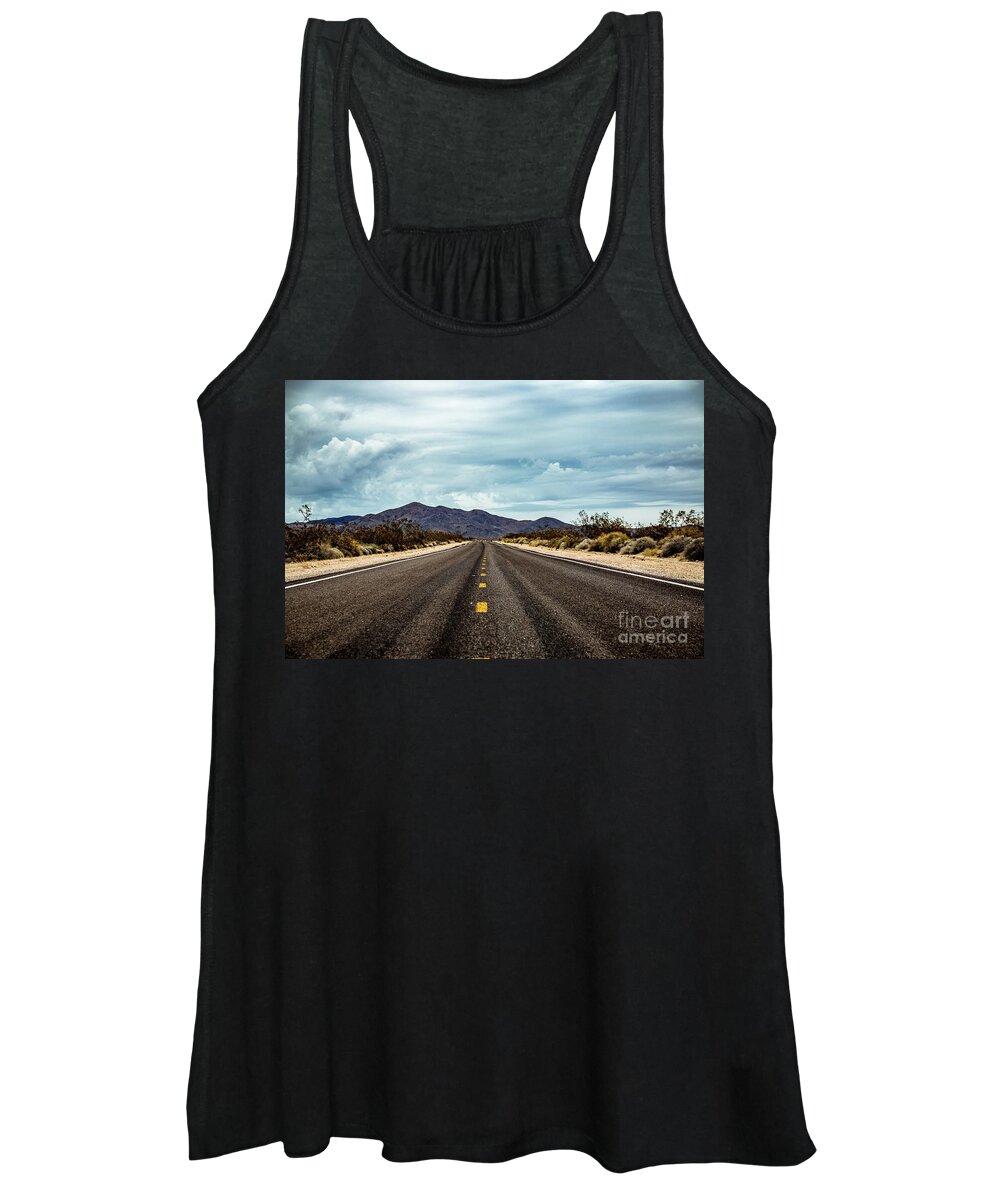 Car Women's Tank Top featuring the photograph Straight road with mountains in the background and clouds by Amanda Mohler