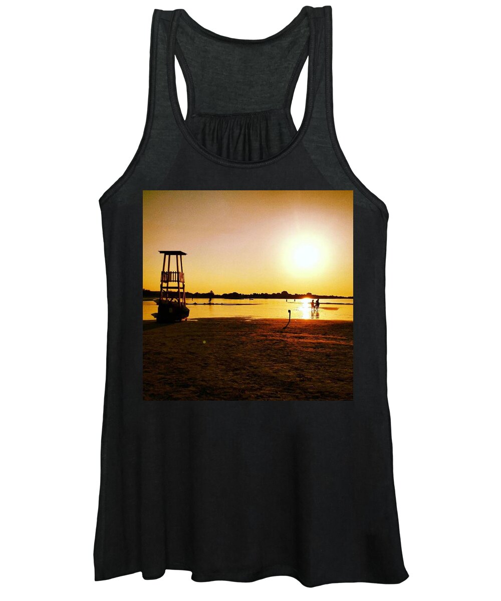 Lifeguard Women's Tank Top featuring the photograph When The Sun Goes Down by Simone Moncelsi