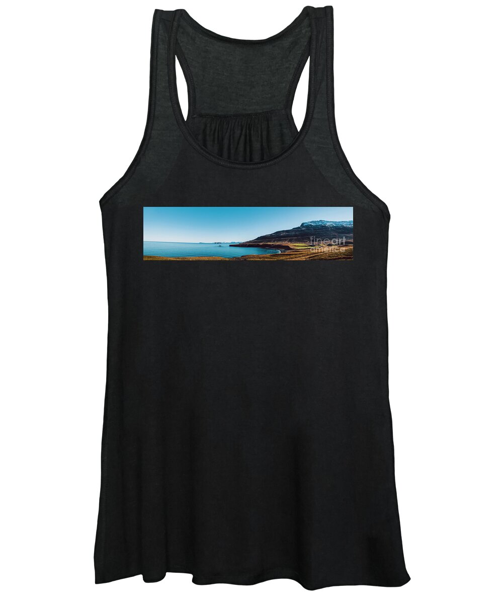 Blue Women's Tank Top featuring the photograph Relaxing landscape to calm down and relieve stress, blue lake with serene and calm waters in the middle of wild nature. #1 by Joaquin Corbalan