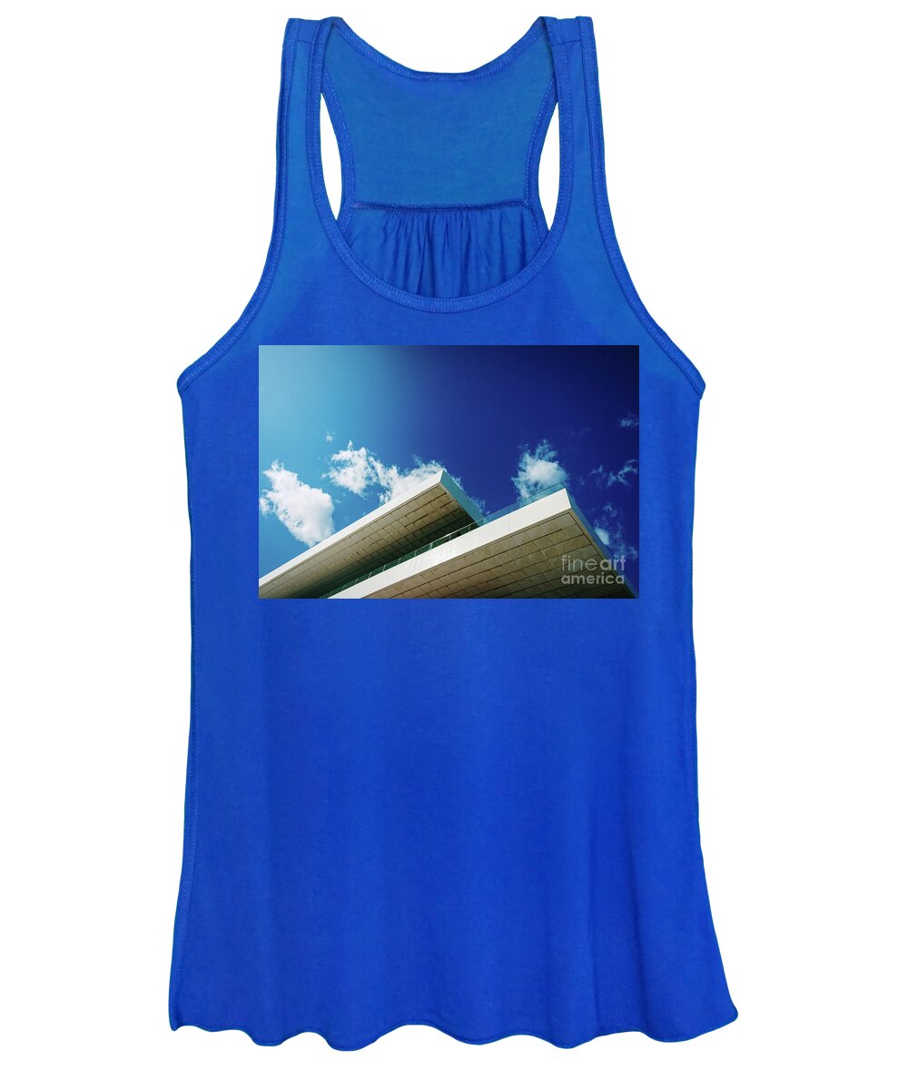 Abstract Women's Tank Top featuring the photograph Blue sky background with clouds and a roof of modern financial business building. by Joaquin Corbalan