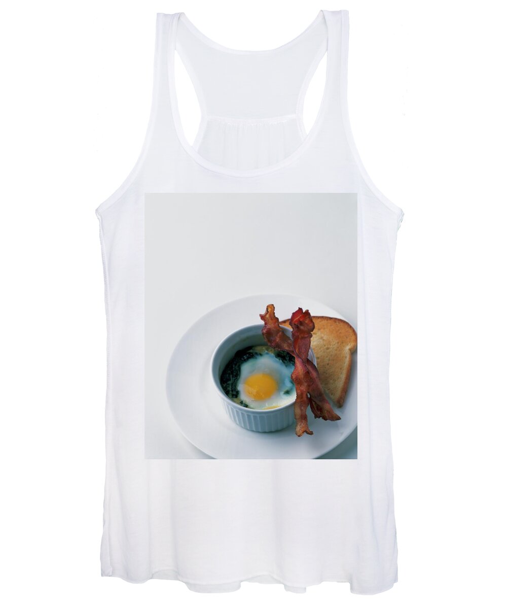 Cooking Women's Tank Top featuring the photograph A Baked Egg With Spinach by Romulo Yanes