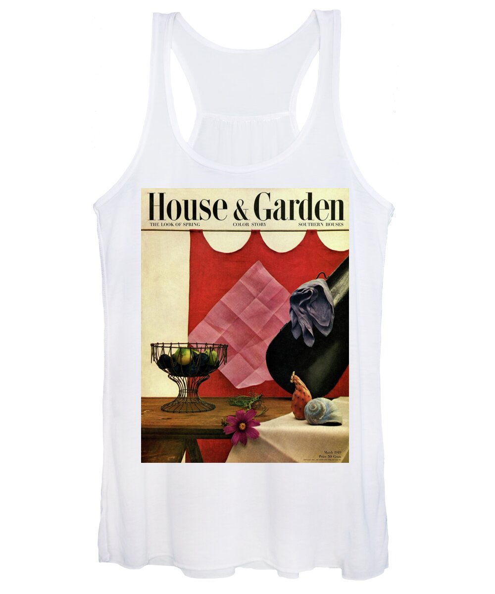 House And Garden Women's Tank Top featuring the photograph A Wire Basket On A Wooden Table by John Rawlings