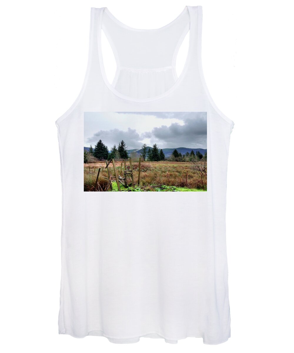 A Slight Mist Or Fog Veils Parts Of Distant Hills Beneath Troubled Skies. Women's Tank Top featuring the photograph Field, Clouds, Distant Foggy Hills by Chriss Pagani