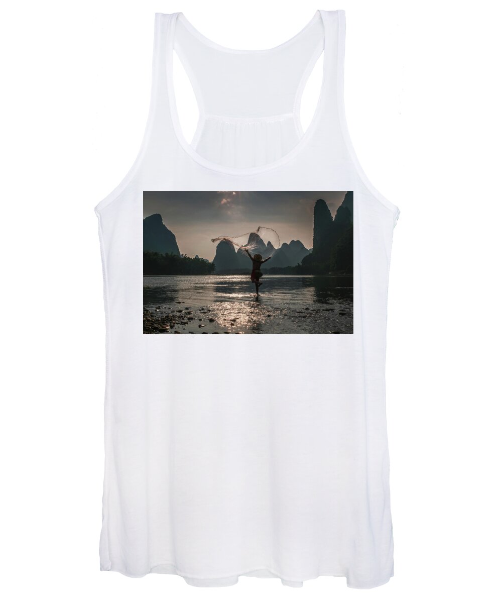 Asia Women's Tank Top featuring the photograph Fisherman casting a net. by Usha Peddamatham