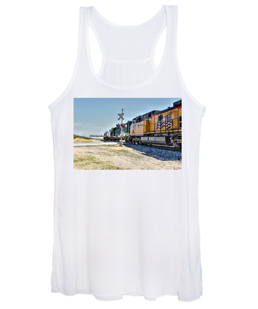 Union Pacific; Building America; Frieght Train; Train Cars; Train Crossing; Train Signal; Railway; Railroad Crossing; Yellow; Red; Blue; Green; Mojave Desert; Mohave Desert; Antelope Valley; California; Joe Lach Women's Tank Top featuring the photograph Union Pacific by Joe Lach