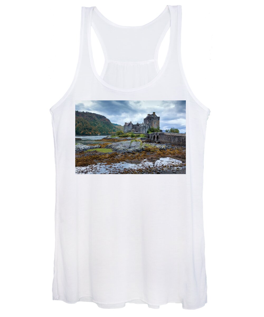 Castle Women's Tank Top featuring the photograph A storm brews over Eilean Donan Castle, Scotland by Jane Rix