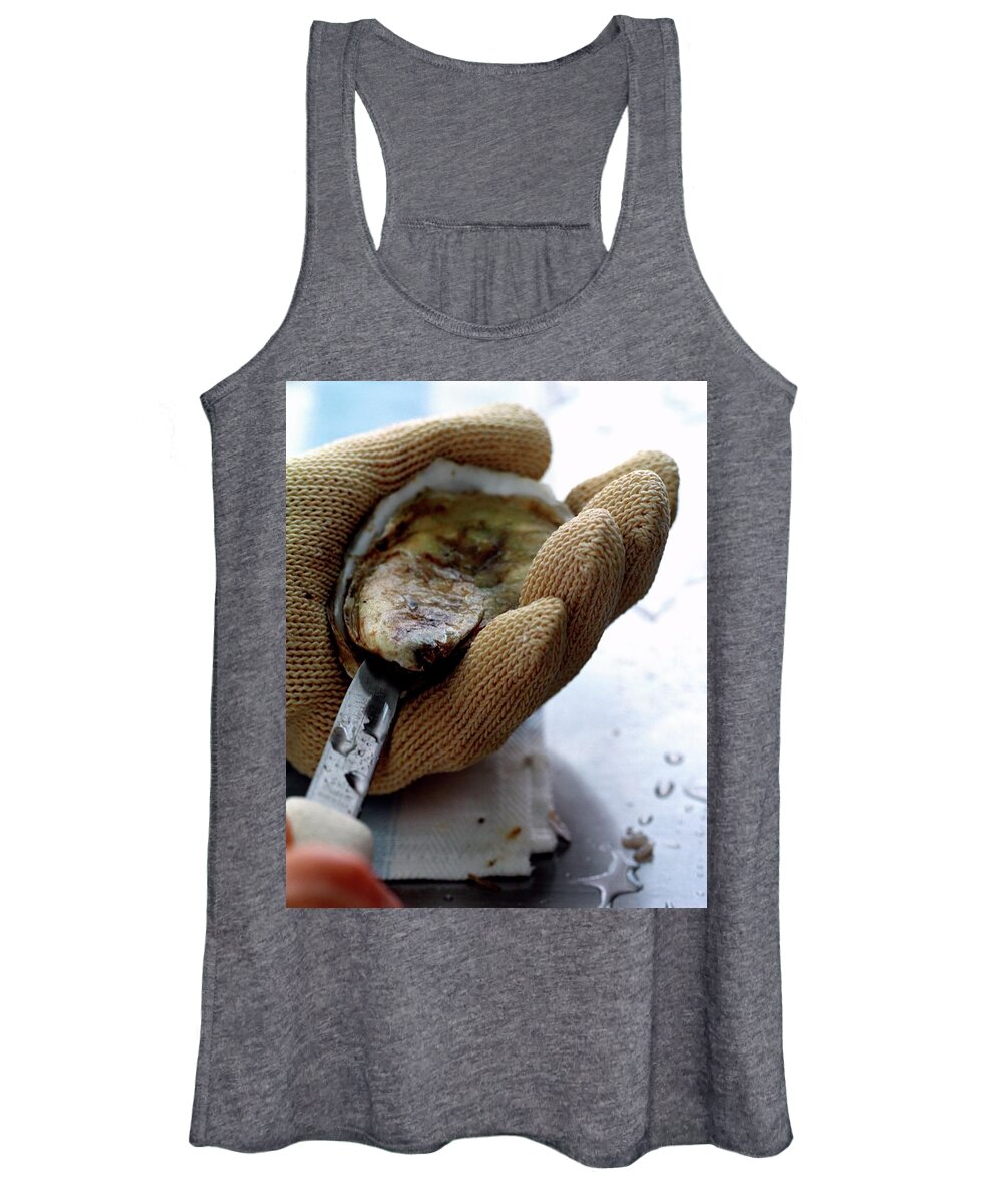 Cooking Women's Tank Top featuring the photograph An Oytser Being Shucked by Romulo Yanes