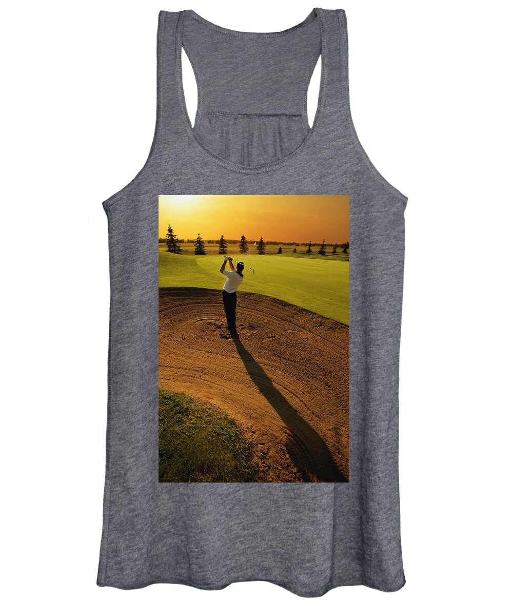 Twilight Women's Tank Top featuring the photograph Golfer Taking A Swing From A Golf Bunker by Darren Greenwood
