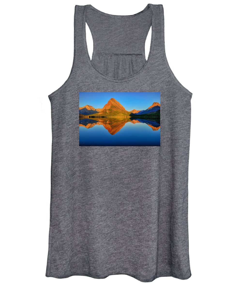 Swiftcurrent Lake Women's Tank Top featuring the photograph Swiftcurrent Morning Reflections by Greg Norrell