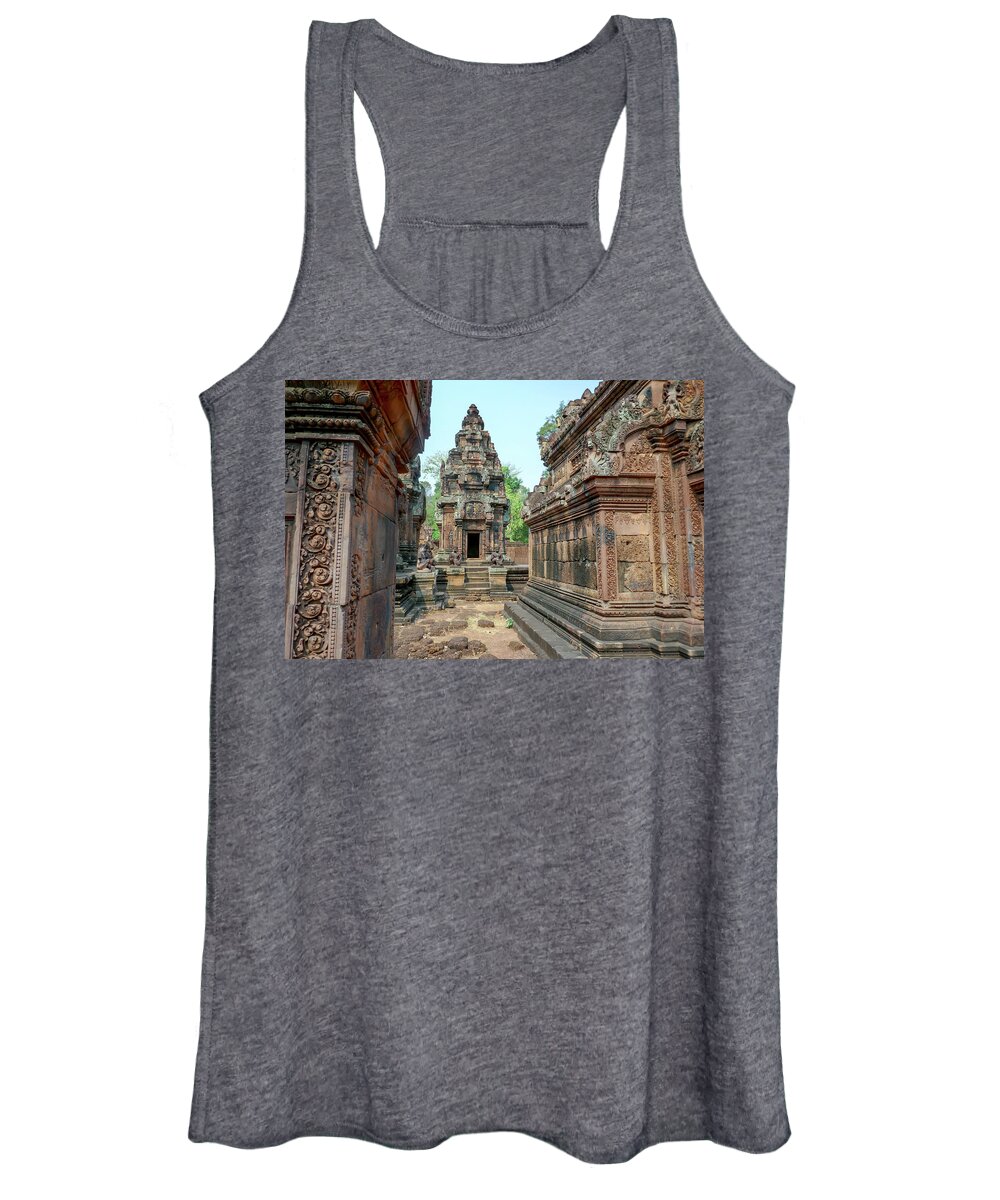 Ancient Women's Tank Top featuring the photograph Carvings in courtyard of Banteay Srei, Siem Reap, Cambodia by Karen Foley