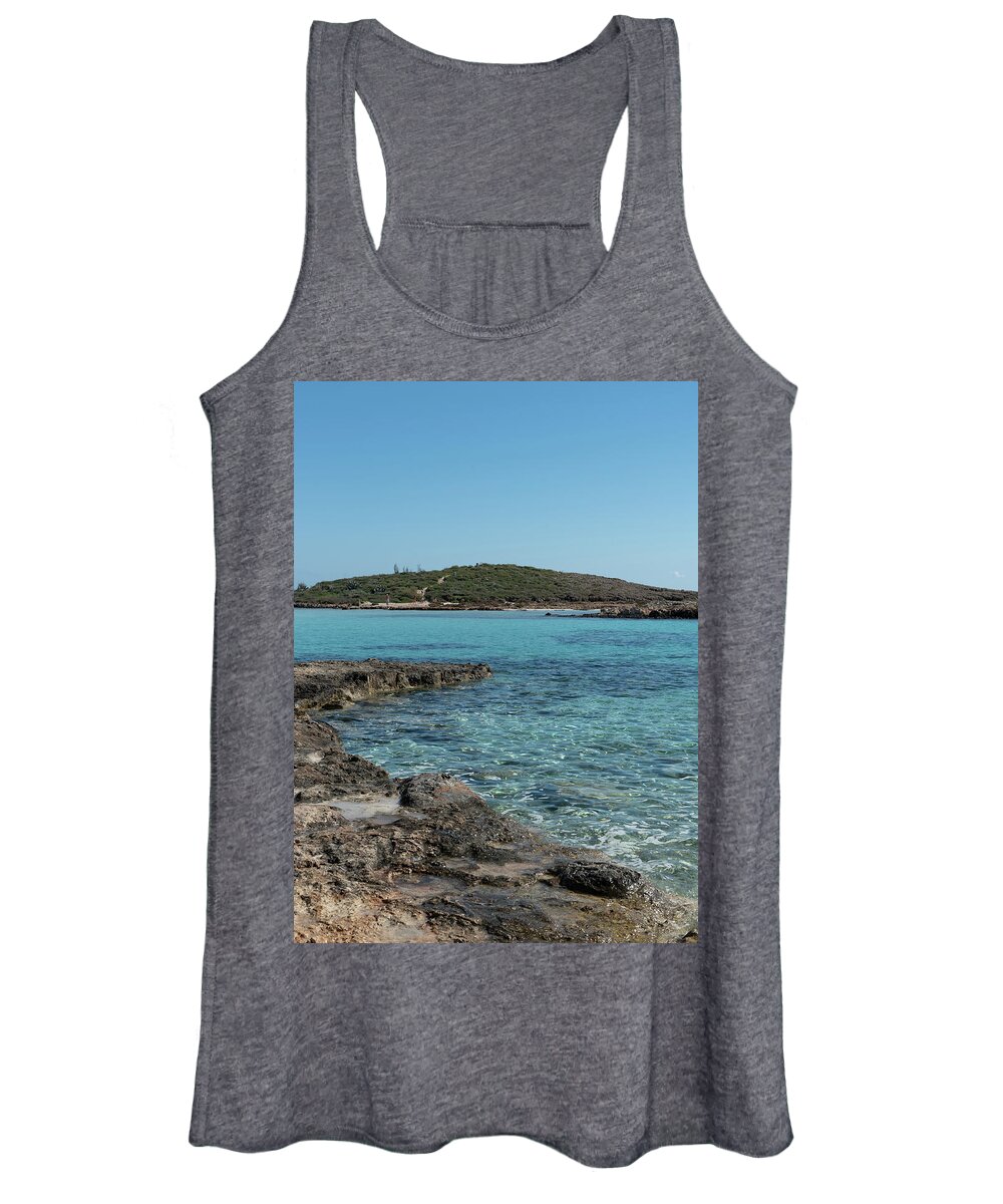 Agia Napa Women's Tank Top featuring the photograph Empty beach with blue water at Nissi beach ayia napa Cyprus. Famous tourist resort with clean water by Michalakis Ppalis