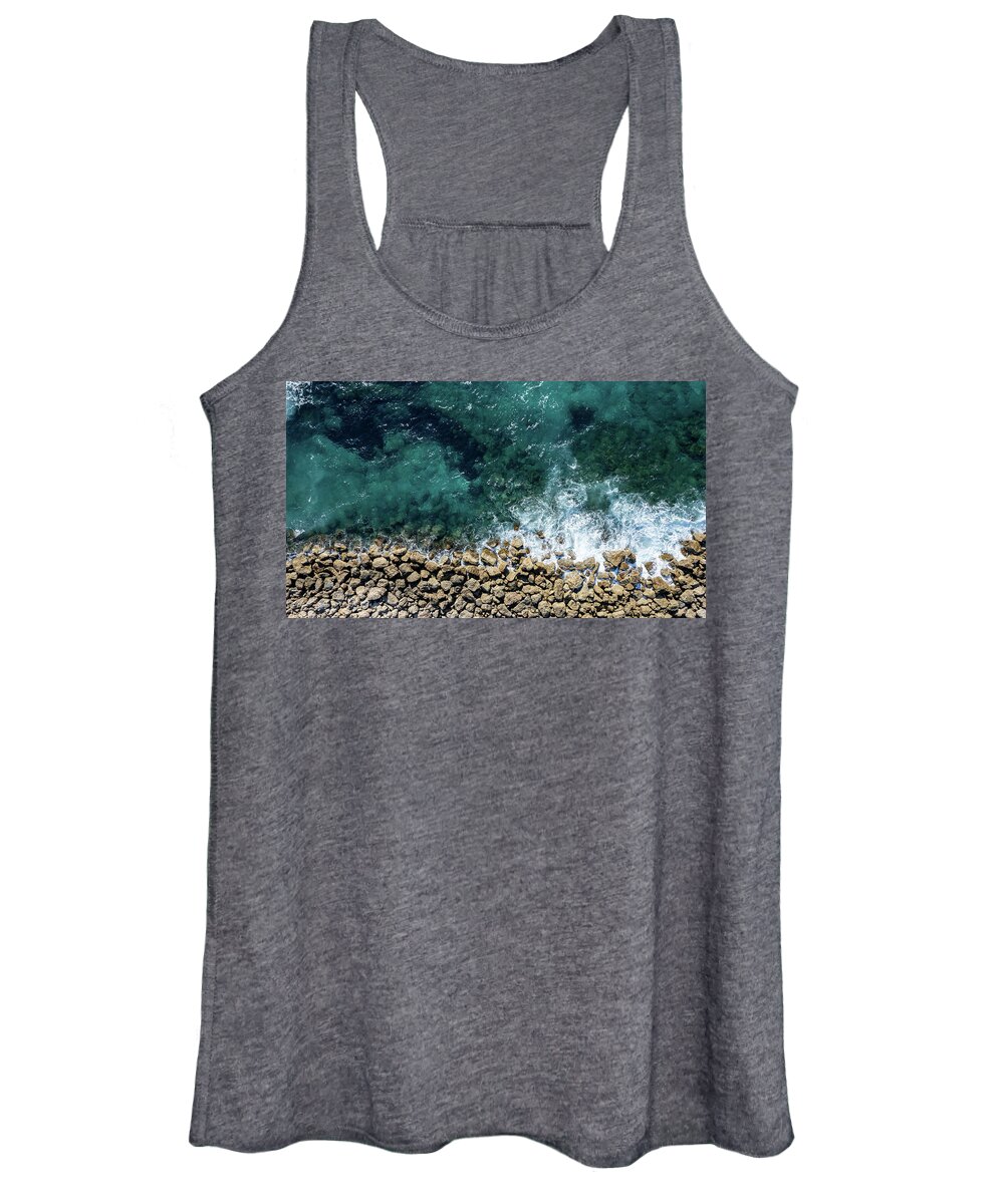 Seascape Women's Tank Top featuring the photograph Aerial view from flying drone of crystal blue ocean water and sea wall. by Michalakis Ppalis