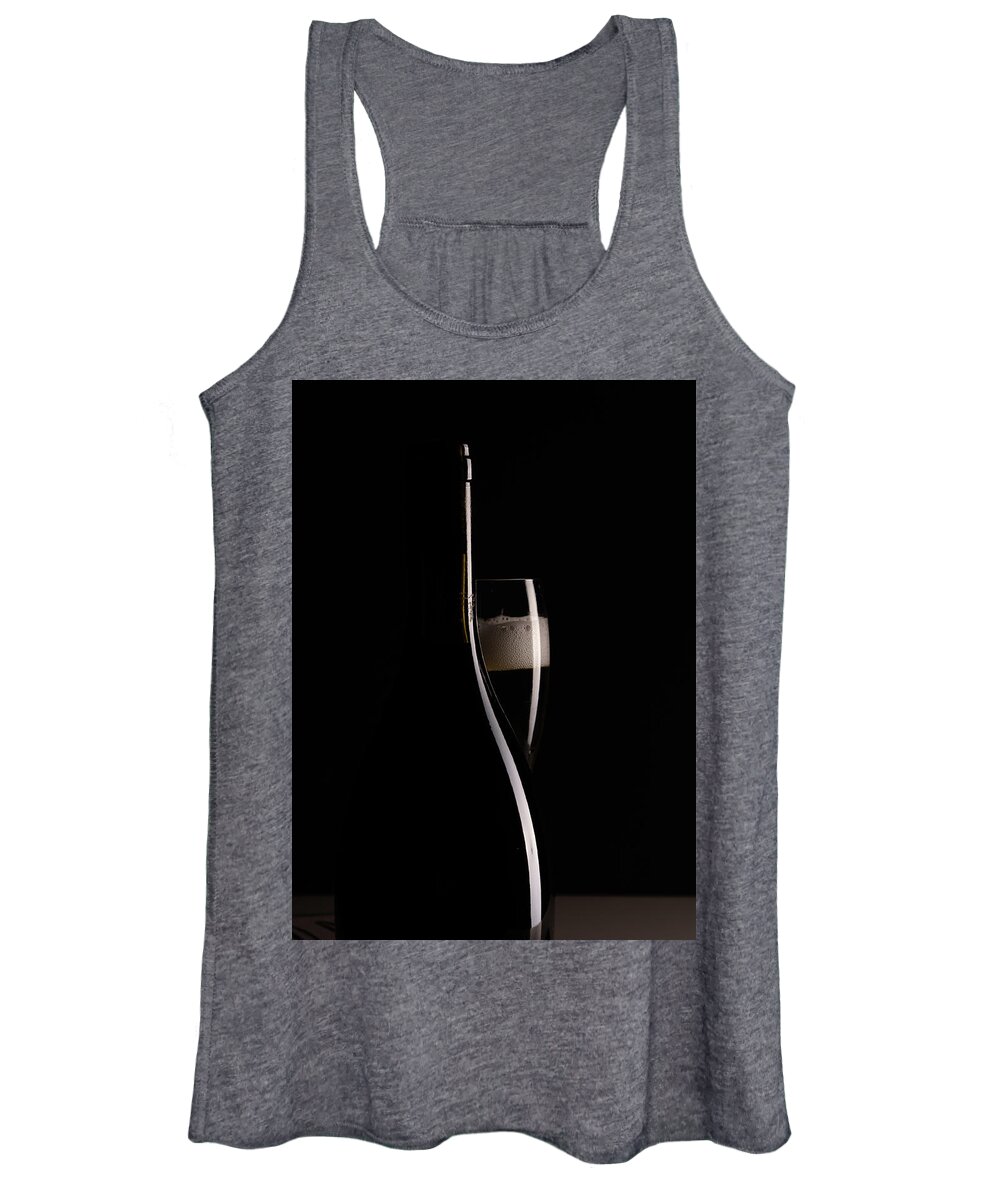 Red Wine Women's Tank Top featuring the photograph Red sparking wine on a wineglass and black wine bottle. by Michalakis Ppalis