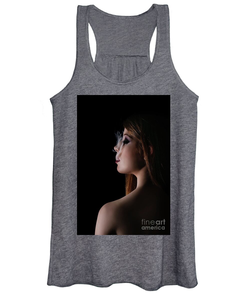 Beauty Women's Tank Top featuring the photograph Low key portrait of a woman with smoke coming out of her mouth by Mendelex Photography