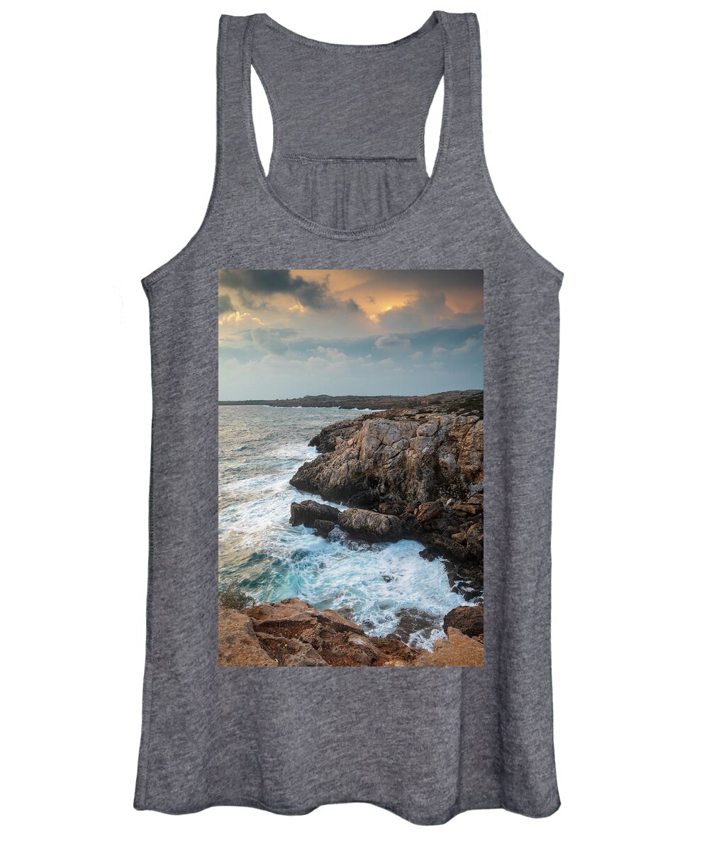 Stormy Sea Women's Tank Top featuring the photograph Seascape with windy waves during stormy weather at sunset. by Michalakis Ppalis
