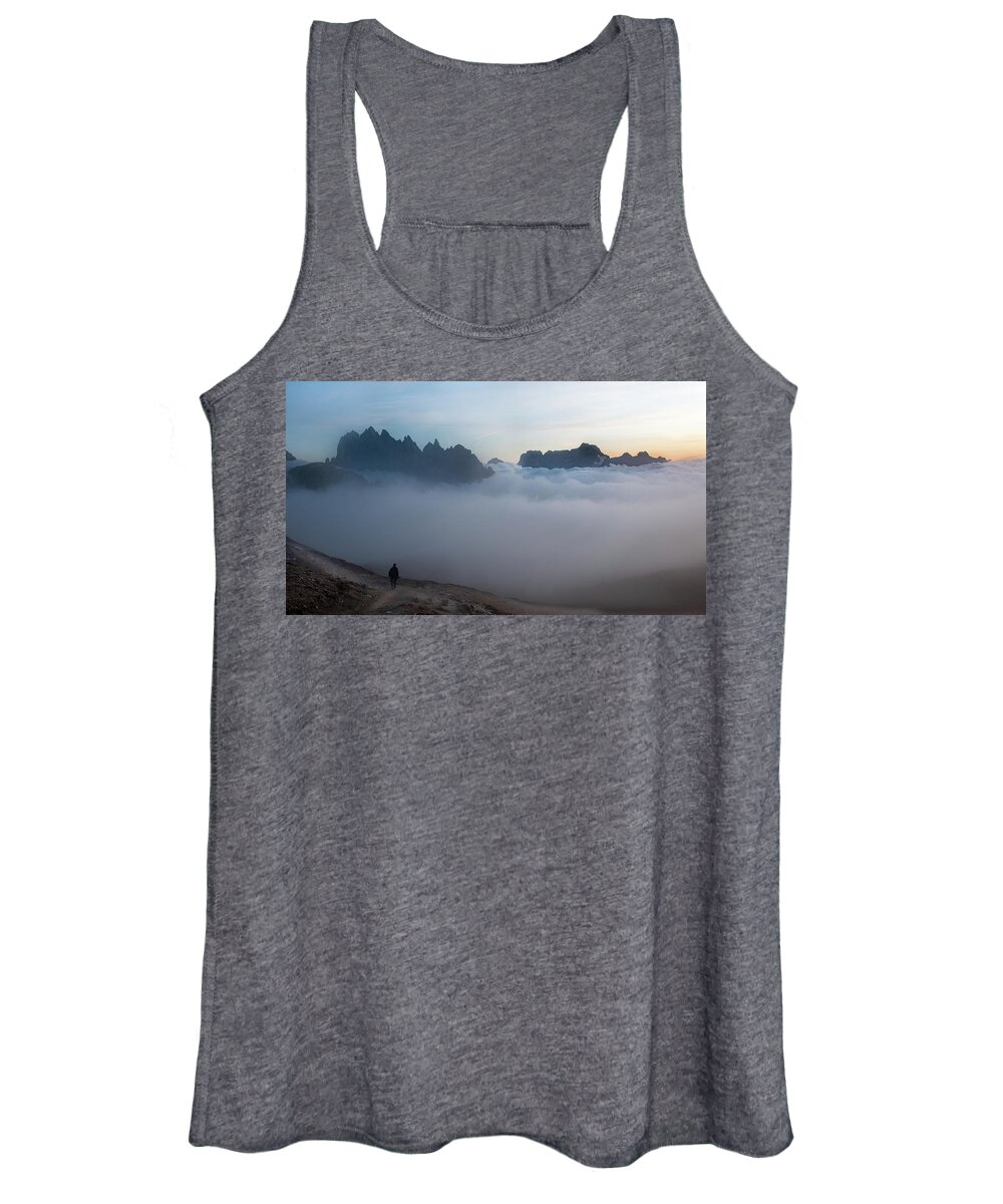 Italian Alps Women's Tank Top featuring the photograph Unrecognized man trekking at the hiking path at Tre Cime in South Tyrol in Italy. by Michalakis Ppalis