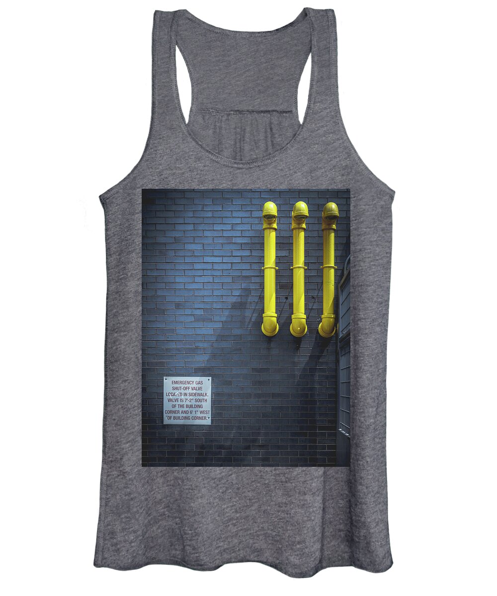Yellow Pipes Women's Tank Top featuring the photograph yellow pipes - Queens, NY by Steve Stanger
