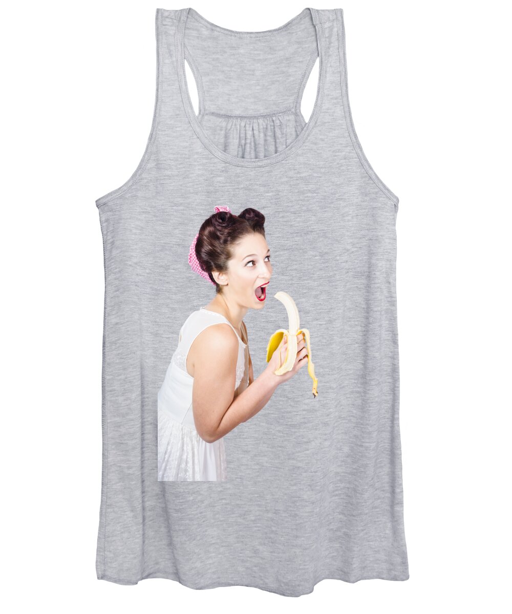 Fruit Women's Tank Top featuring the photograph Pin-up woman eating fruit on studio background by Jorgo Photography