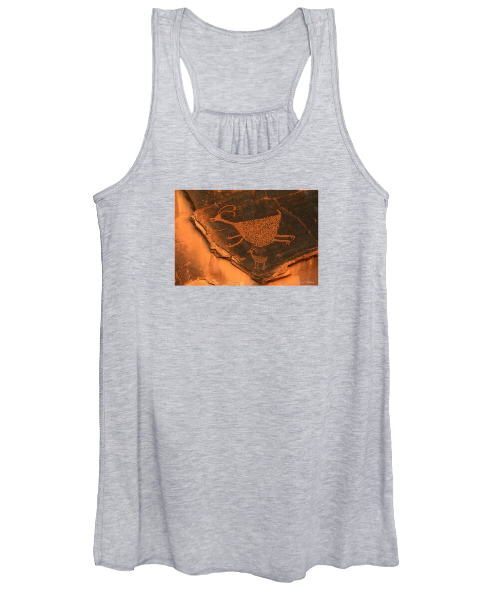 Petroglyph Women's Tank Top featuring the photograph Rock art at Eye Of The Sun Arch by Dan Norris