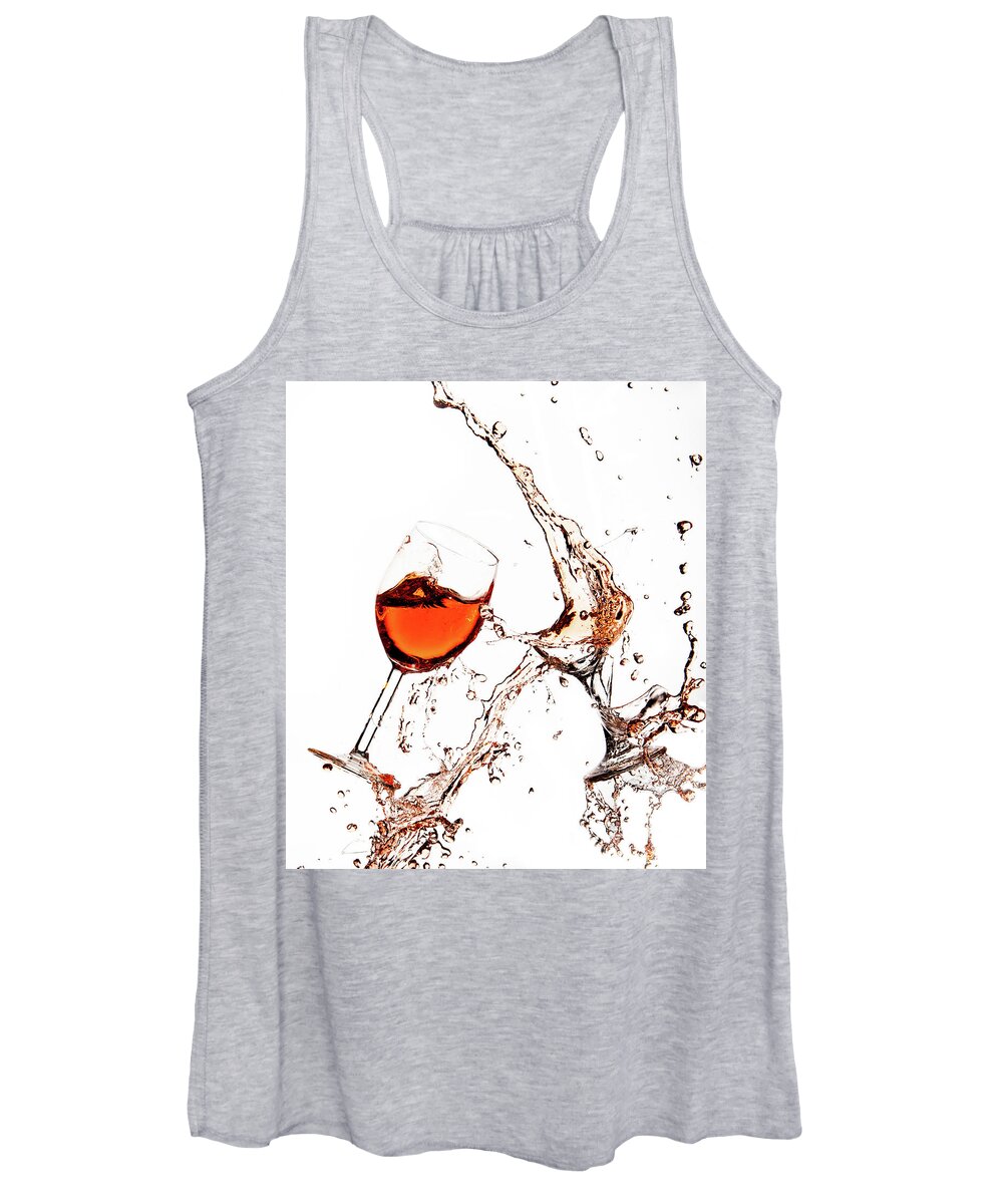 Damaged Women's Tank Top featuring the photograph Broken wine glasses with wine splashes on a white background #2 by Michalakis Ppalis