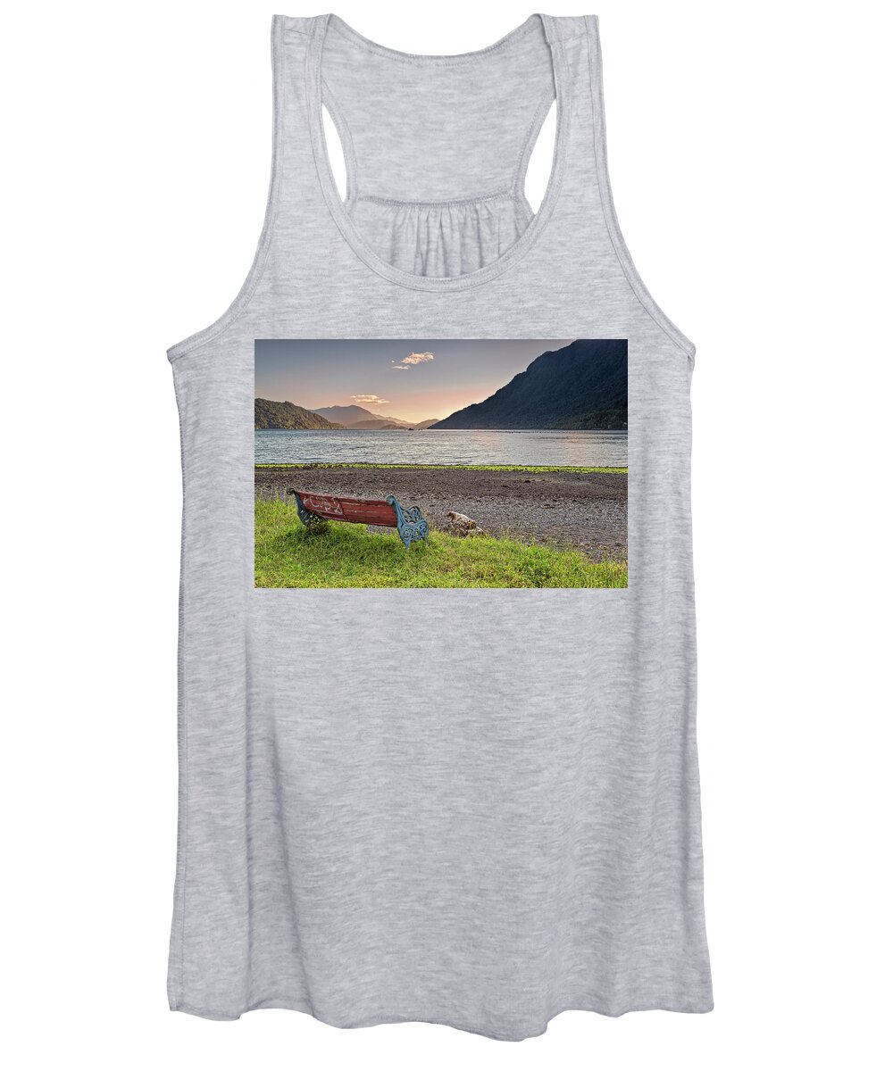 Chili Women's Tank Top featuring the photograph Bench with a peacefull view on the Hornopiren fjord on sunset by Henri Leduc