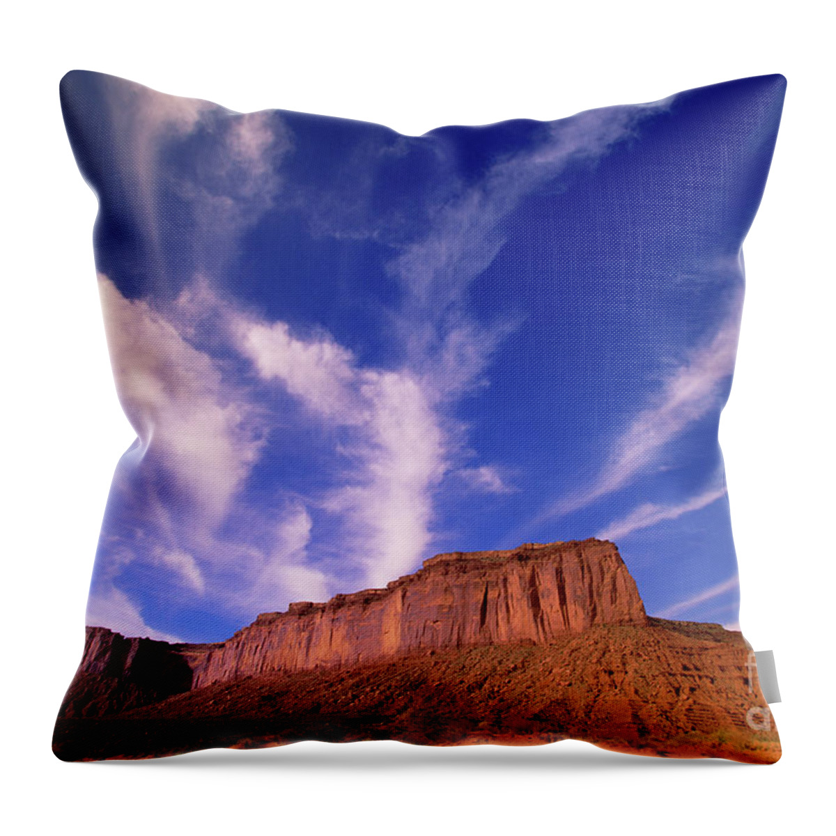 00340878 Throw Pillow featuring the photograph Clouds Over Monument Valley by Yva Momatiuk and John Eastcott