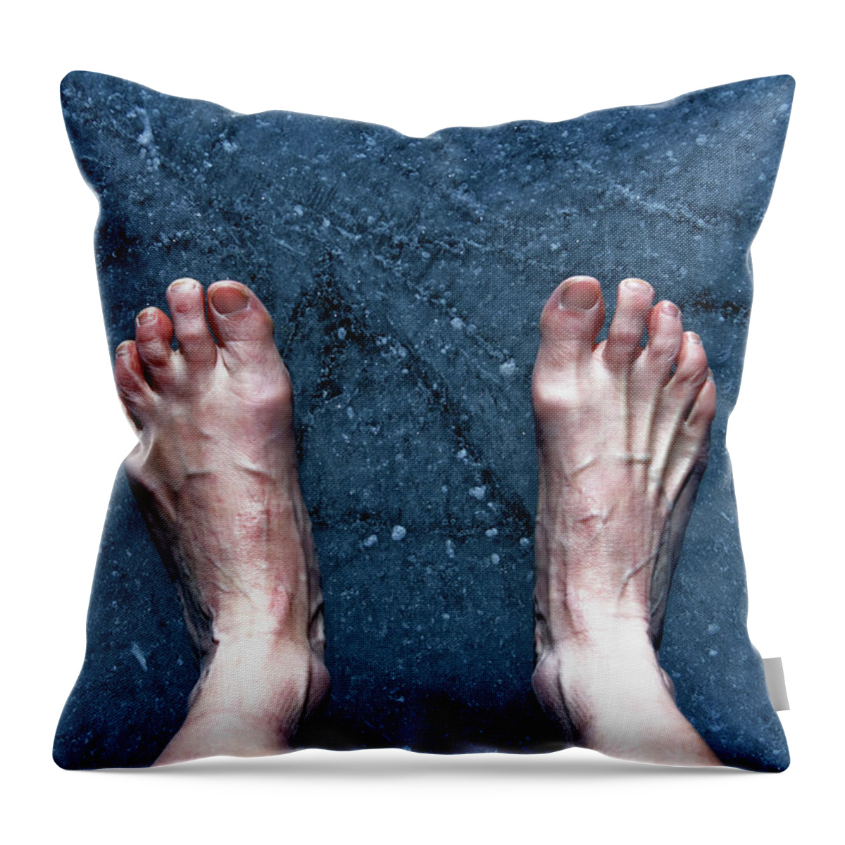 A Womens Bare Feet Standing On Ice Throw Pillow by Ron Koeberer