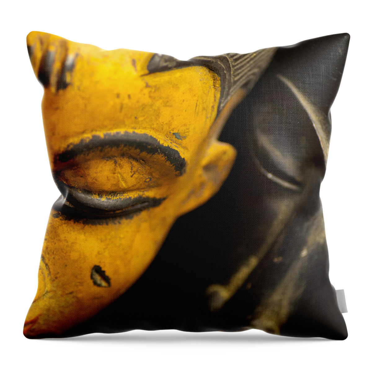 Abstract Throw Pillow featuring the photograph African Masks by Raul Rodriguez
