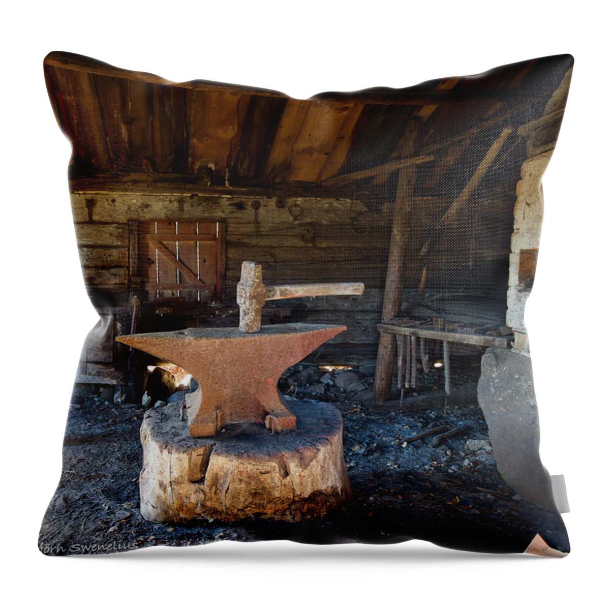 Blacksmiths Tools Throw Pillow featuring the photograph Blacksmiths tools by Torbjorn Swenelius