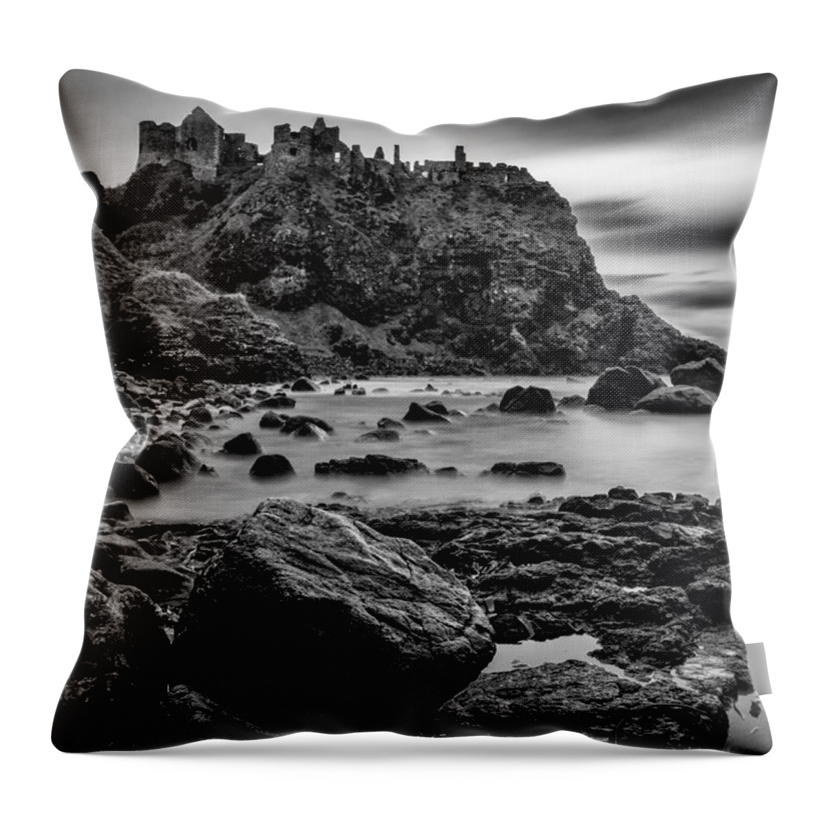 Dunluce Throw Pillow featuring the photograph Dunluce Castle by Nigel R Bell