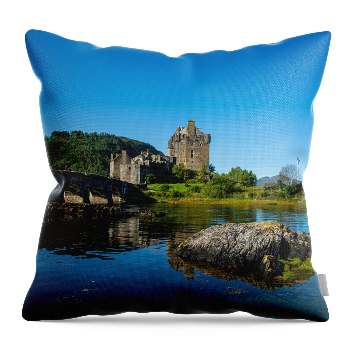 Scotland Throw Pillow featuring the photograph Eilean Donan Castle In Scotland by Andreas Berthold